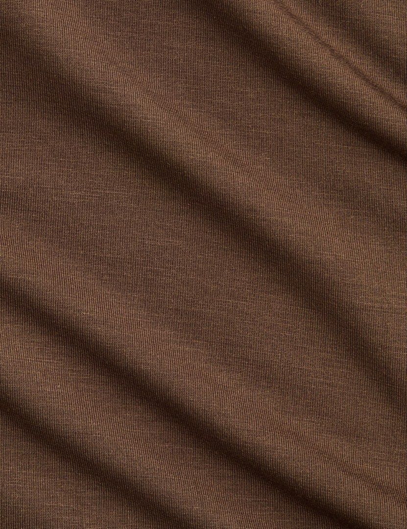 Brown Mock Neck Sleeveless Top (Category: Sleeveless) located in Manila. Submitted by paperthread (Listing ID 1452487320, Image 3). Description: - Brown sleeveless top - Mock neck design - Textured fabric for a chic look - Comfortable fit - Perfect for layering or wearing on its own - Versatile: pairs well with trousers or skirts.