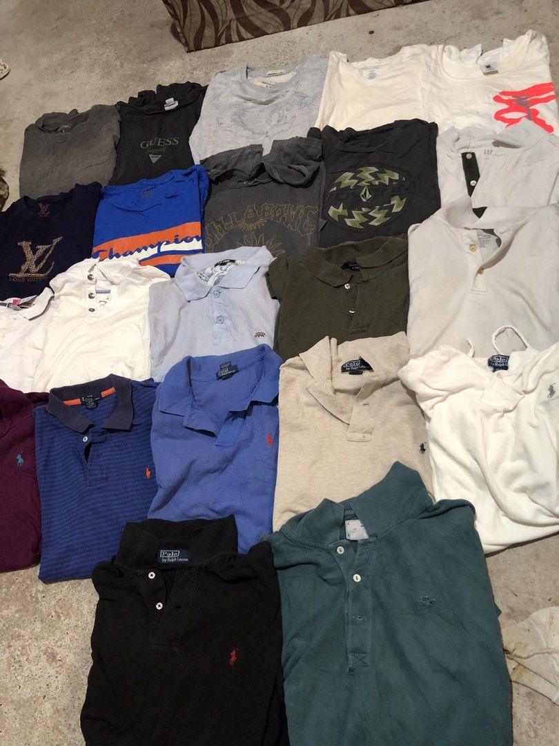 BUNDLE 22 pcs luxury streetwear (Category: Tshirts & Polo Shirts ) located in San Jose. Submitted by mightycloud-7dc0 (Listing ID 1452409321, Image 2). Description: - Bundle of men's tops - Brands include Polo Ralph Lauren, Guess, and Louis Vuitton - Mix of polo shirts and graphic tees - Available in different colors and sizes - Perfect for casual wear - Please check photos for individual item details.