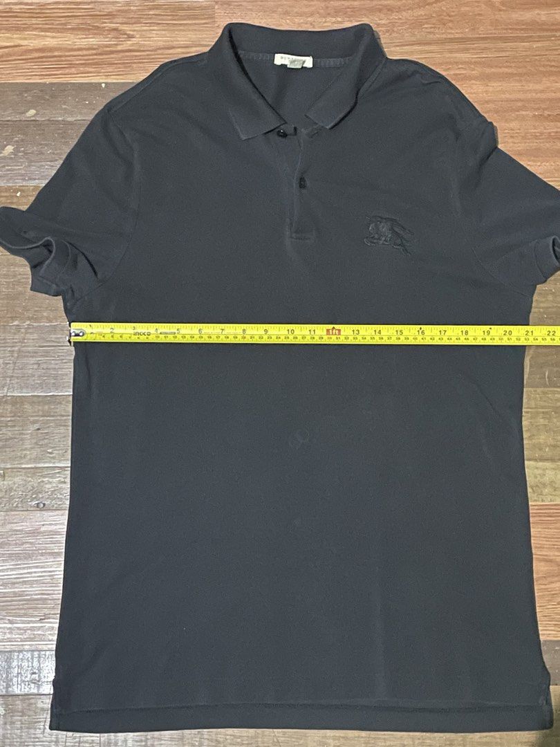 Burberry Black Polo Shirt (Category: Tshirts & Polo Shirts ) located in Angeles City. Submitted by caerus8 (Listing ID 1452421607, Image 2). Description: Negotiable. Decluttering old (now to big for me) clothes..