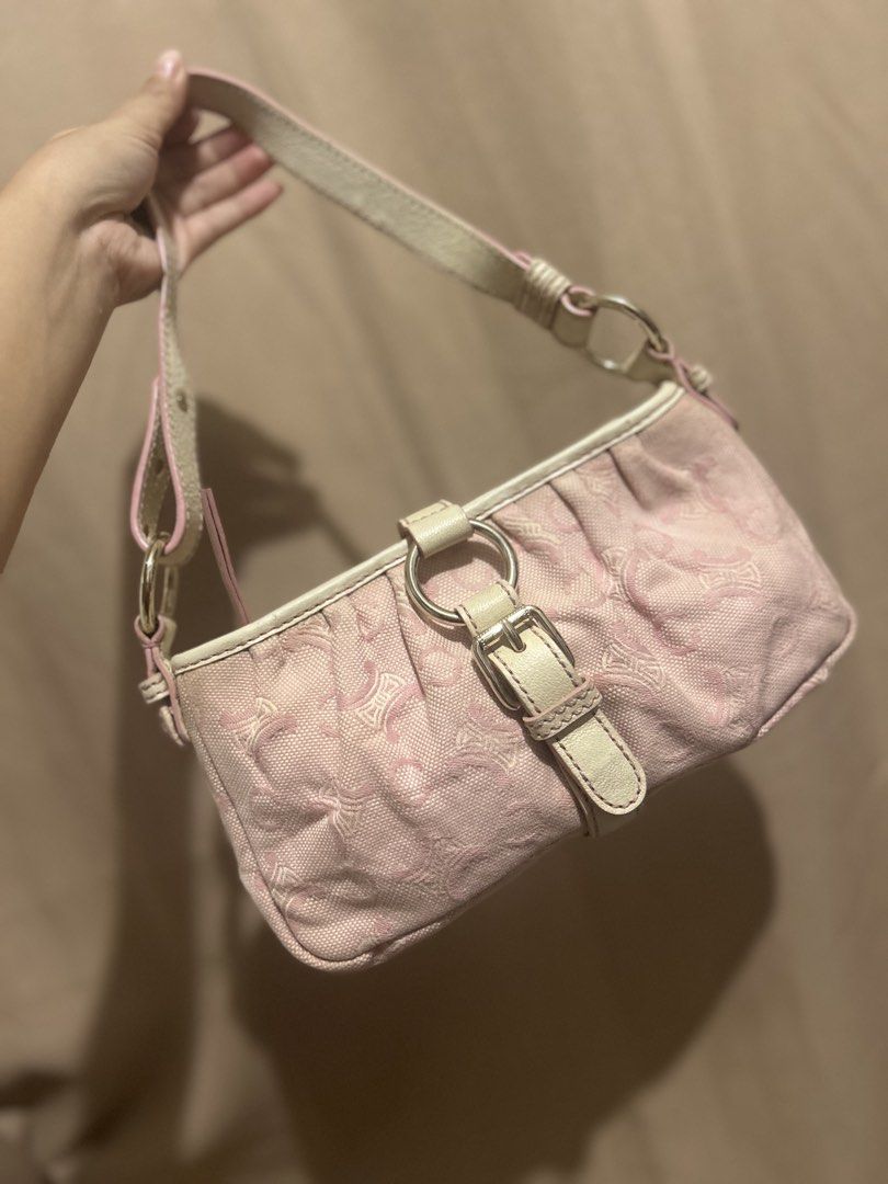 Celine Pink Monogram Canvas Shoulder Bag (Category: Luxury Bags & Wallets) located in Angeles City. Submitted by nikki.tan444 (Listing ID 1452503484, Image 1). Description: - Cute pink shoulder bag with iconic Celine monogram pattern. - Features elegant beige leather trim and strap. - Accented with stylish silver hardware and a front buckle detail. - Compact size, ideal for carrying your essentials. - Perfect for a chic and casual day out..
