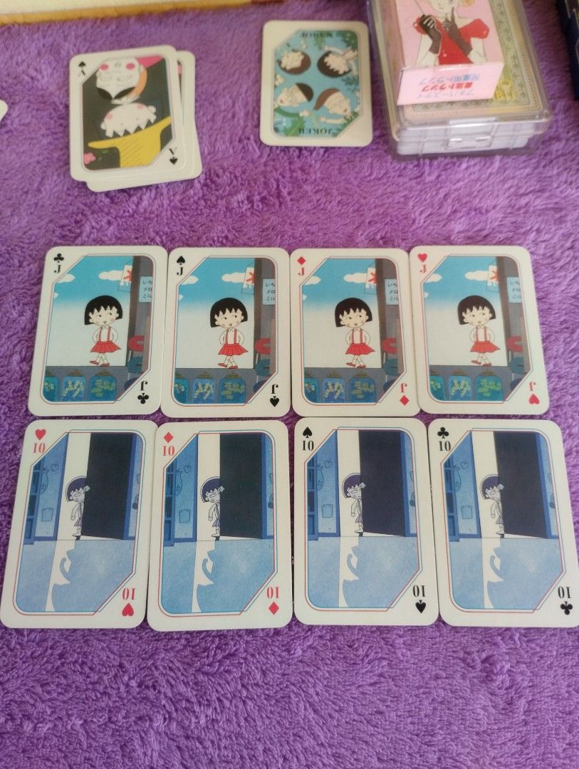 Chibi Maruko Chan Playing Cards Set (Category: Board Games & Puzzles) located in Davao. Submitted by mengsmixitems (Listing ID 1452341942, Image 1). Description: - Set of Chibi Maruko Chan playing cards - Features various characters from the anime - Includes Jacks, Tens, Aces, and other standard card ranks - Perfect for fans of the show - Comes with a clear plastic case - Please note: Some cards are duplicates.