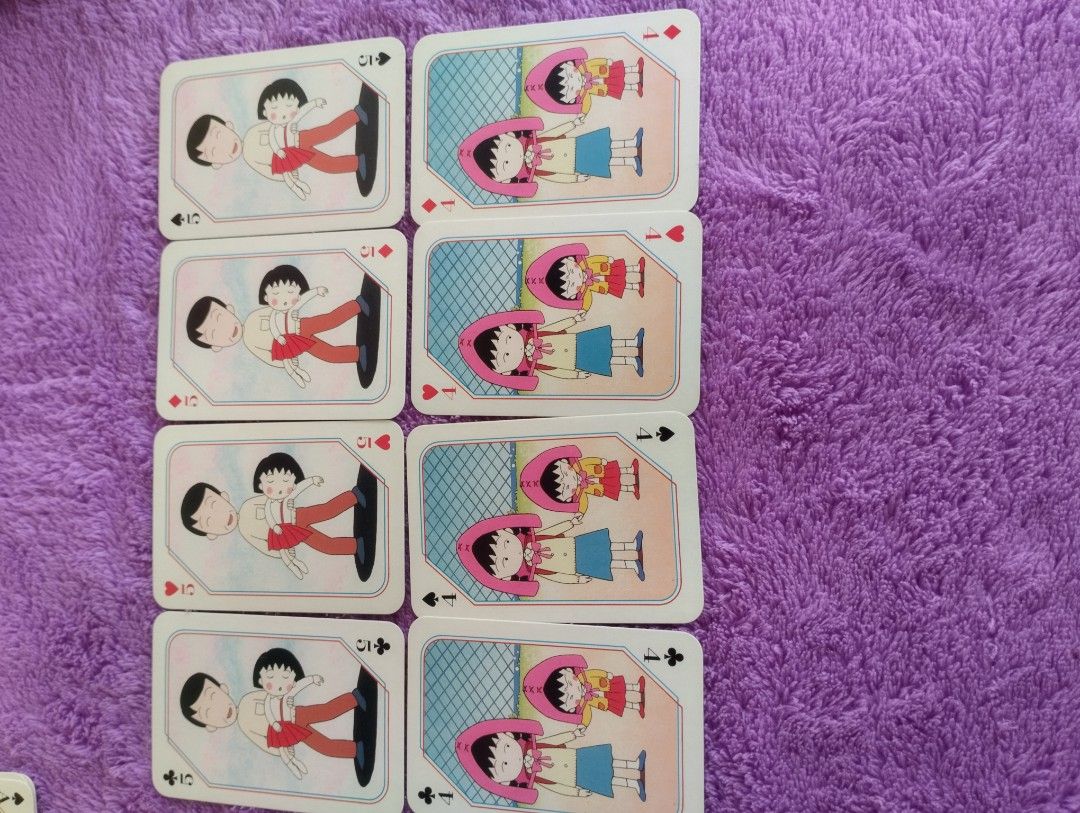 Chibi Maruko Chan Playing Cards Set (Category: Board Games & Puzzles) located in Davao. Submitted by mengsmixitems (Listing ID 1452341942, Image 3). Description: - Set of Chibi Maruko Chan playing cards - Features various characters from the anime - Includes Jacks, Tens, Aces, and other standard card ranks - Perfect for fans of the show - Comes with a clear plastic case - Please note: Some cards are duplicates.
