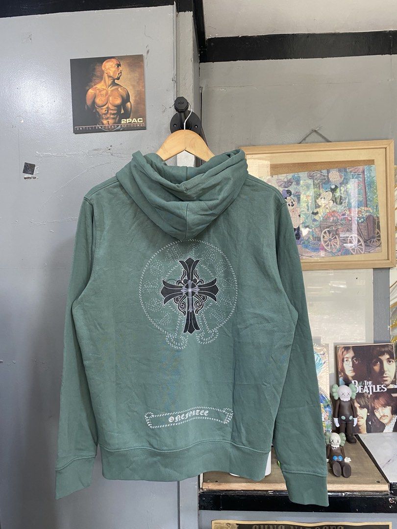 Chrome Hearts Green Hoodie (Category: Hoodies) located in Davao. Submitted by ruggedthrift444 (Listing ID 1452331826, Image 2). Description: - Green hoodie with iconic Chrome Hearts logo on front and back - Features long sleeves, a convenient front pocket, and an adjustable drawstring hood - Boasts eye-catching graphic details - Perfect for stylish and comfortable casual wear.
