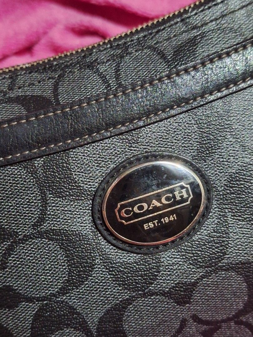 Coach Monogram Canvas Shoulder Bag (Category: Luxury Bags & Wallets) located in Quezon City. Submitted by cloudymay (Listing ID 1452331489, Image 1). Description: - Coach shoulder bag - Classic black monogram pattern - Secure zip top closure - Interior leather tag with serial number - Stylish silver hardware details - Adjustable strap for comfort - Ideal for everyday wear - replaced sling, can be a kili bag if you have a short strap available. -K