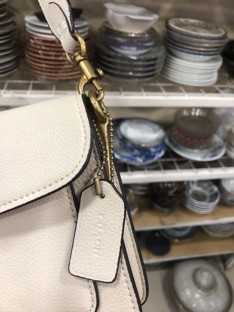 COACH SHOULDER BAG (Category: Sling Bags) located in Manila. Submitted by beyondessence (Listing ID 1452404799, Image 2). Description: Coach Tabby 26 Shoulder Bag in Chalk White Polished Pebble Leather Excellent condition- to asnew.