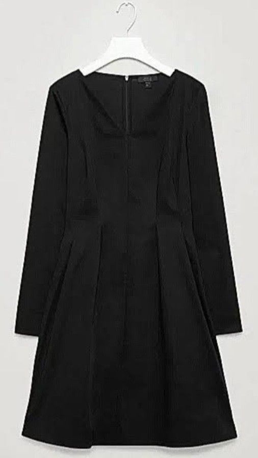 Authentic COS Black Long Sleeve A-Line Dress (Category: Dresses) located in Caloocan City. Submitted by noy5o1a (Listing ID 1452498720, Image 1). Description: -COS brand -Simple yet elegant black dress - Long sleeves - Flattering V-neckline - Convenient back zipper - Beautifully pleated skirt for a lovely flare - Versatile for casual or semi-formal occasions - Easy to accessorize and style.