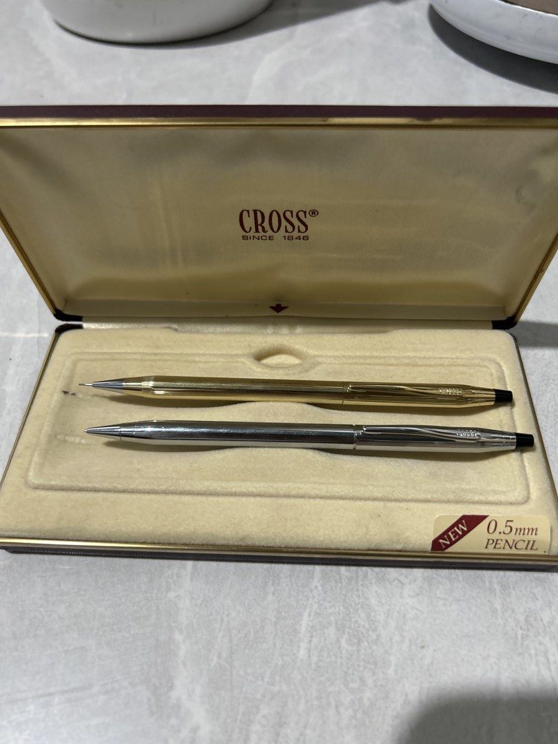 Cross Pen and Pencil Set in Original Box (Category: Stationery & School Supplies) located in San Fernando. Submitted by TheBTBs (Listing ID 1452427975, Image 1). Description: - Elegant Cross pen and 0.5mm mechanical pencil set. - Classic gold and silver finish. - Includes original Cross presentation box. - Ideal gift for those who appreciate fine writing instruments..