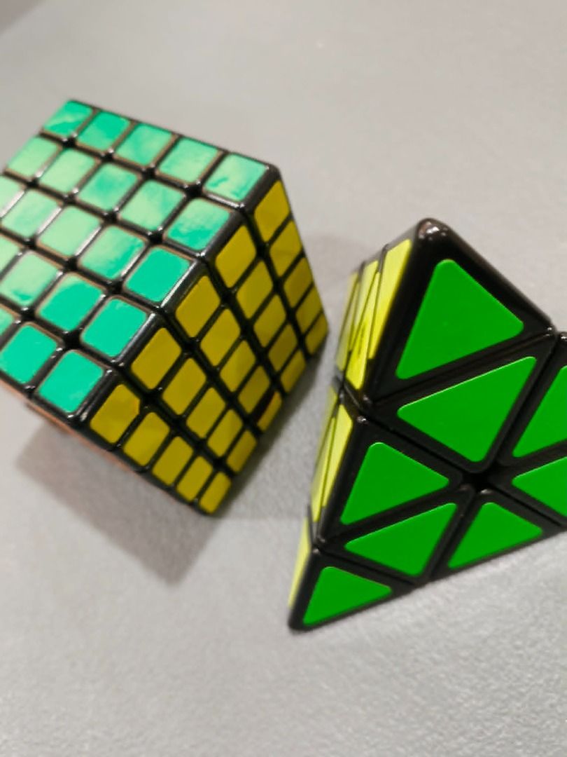 Cube Bundle: Original Rubik's Brand 3x3 Cube (Tiled Version) 5x5 Professor's Cube & Pyraminx Triangle Puzzle (Category: Board Games & Puzzles) located in Bacolod City. Submitted by fridayrolls (Listing ID 1452391938, Image 3). Description: Selling as a bundle! Perfect for beginners, casual cubers, or parents looking for budget-friendly brain teasers to keep kids off their phones. What’s Included: Selling an authentic, original 3x3 Rubik's Brand c