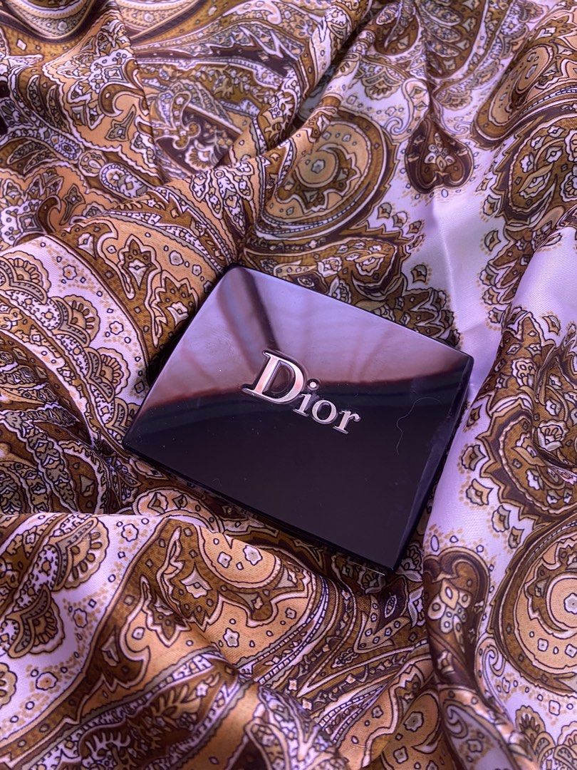 Dior 5 Couleurs Couture Eyeshadow Palette (Category: Makeup) located in Baguio. Submitted by xy_03 (Listing ID 1452330751, Image 2). Description: - Authentic Dior eyeshadow palette - Shade: 359 Cosmic Eyes - Includes applicator brush (one brush missing) - Features a built-in compact mirror - Ideal for creating various eye makeup looks Ps: Shipping Fee not included.