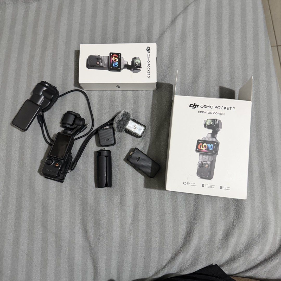 DJI Osmo Pocket 3 Creator Combo (Category: Cameras) located in Pasay City. Submitted by datimataba (Listing ID 1452423563, Image 2). Description: - DJI Osmo Pocket 3 Creator Combo - Complete vlogging and content creation package - Includes: Camera, Microphone, Tripod, Battery Handle, Bag - Compact and user-friendly design - Ideal for travel and on-the-go filming -Good As new, replaced unit kaya may isa pang box. Since replacement di na siya nagag