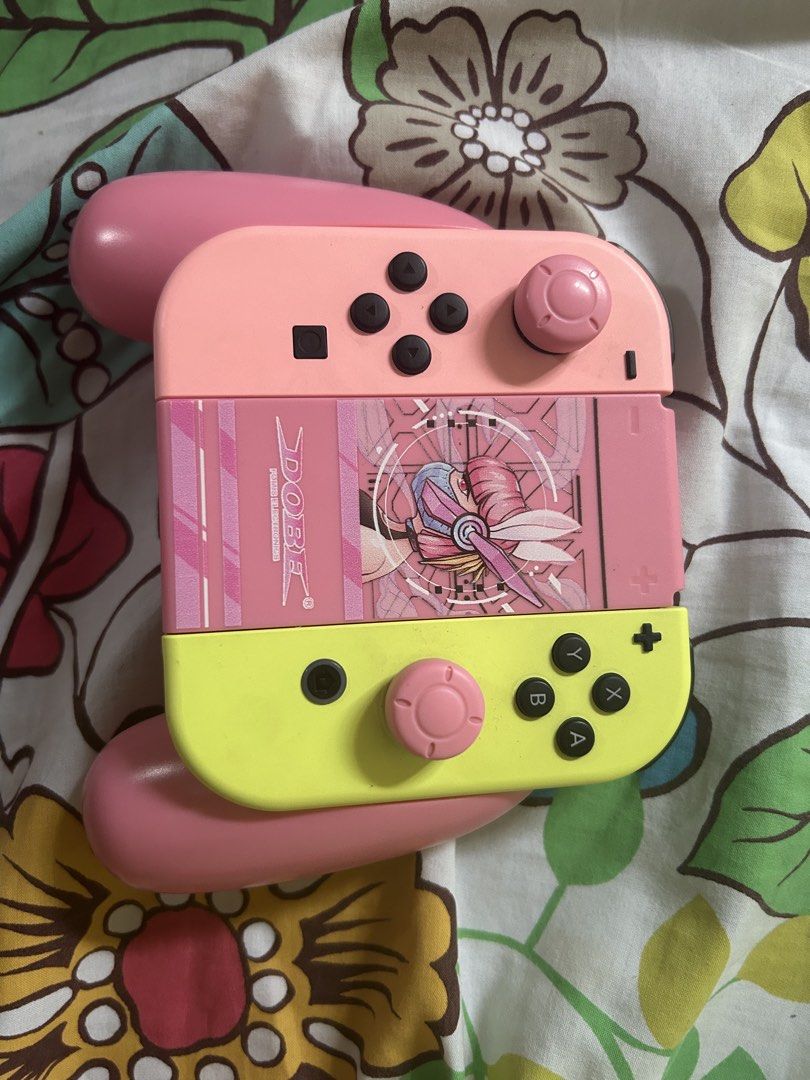Dobe Joycon grip (Category: Nintendo) located in Dasmarinas. Submitted by ryryry102597 (Listing ID 1452341265, Image 3). Description: Dobe joycon grip Almost bnew.