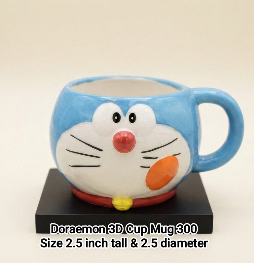 Doraemon 3D Cup Mug (Category: Coffee & Tea Tableware) located in Binan City. Submitted by mayjhe (Listing ID 1452337238, Image 1). Description: 💛 For Sale 💛 🌸 Doraemon 🍀 Ceramic 3D Cup Mug 📍 Condition: Good / with crazing 💰 Price is ₱ 300.00 👉 Other details posted 🇵🇭 Location Biñan Laguna 🛵 Courier J& T and Lalamove 📋 Shipping by schedule 📍 NO COD & COP 📌 All items are carefully packed and labeled with Fragile stickers for breakable