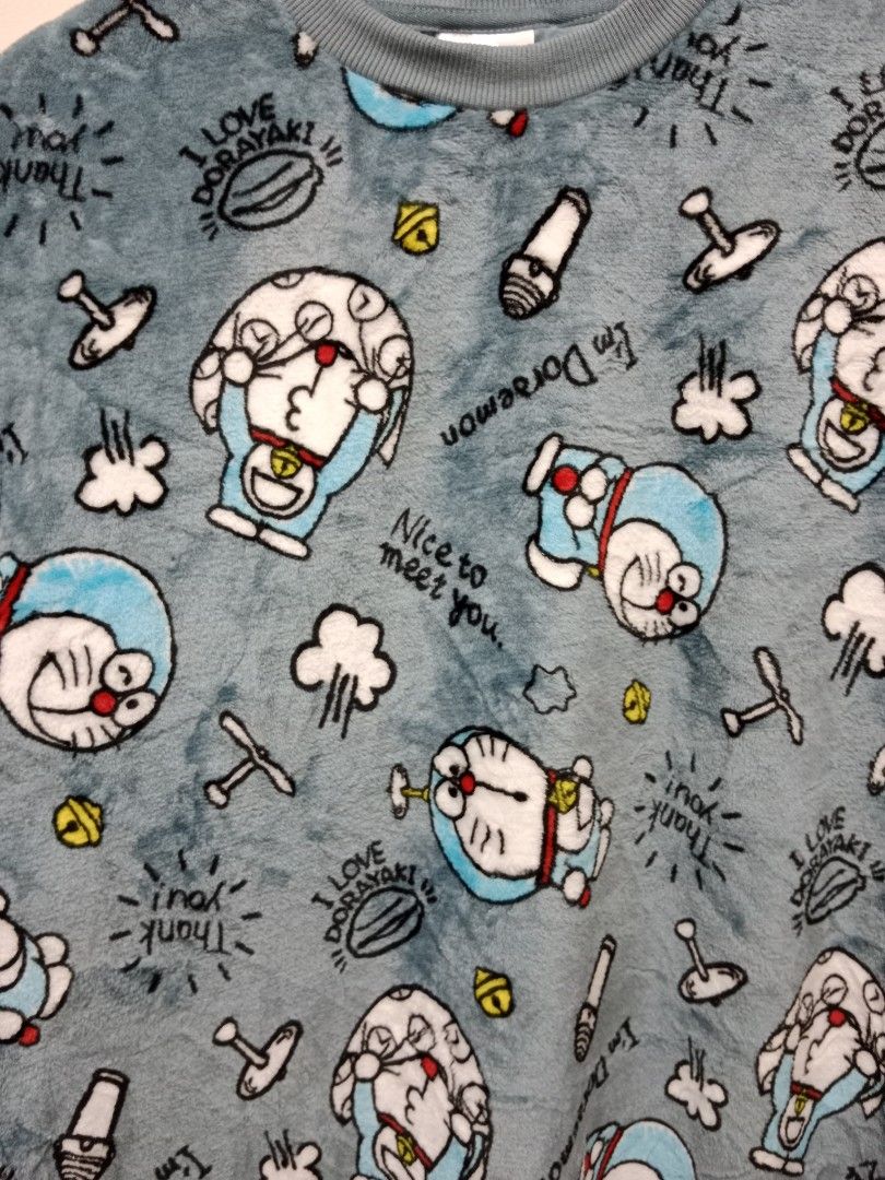 Doraemon sweatshirt full print (Category: Coats, Jackets and Outerwear) located in Sungai Siput. Submitted by deepseastore (Listing ID 1452467310, Image 2). Description: kain sedap.sejuk full print measurement chest - 22.5 inches length - 28.5 inches.