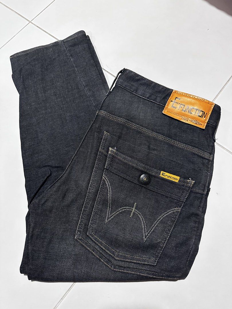 E-function Jeans (Category: Jeans) located in Singapore. Submitted by anson_2828 (Listing ID 1452435641, Image 1). Description: - Brand: E-function Jeans - Size: M - Color: Dark wash with unique textured detailing - Style: Casual, everyday wear - Condition: Excellent, pre-loved.