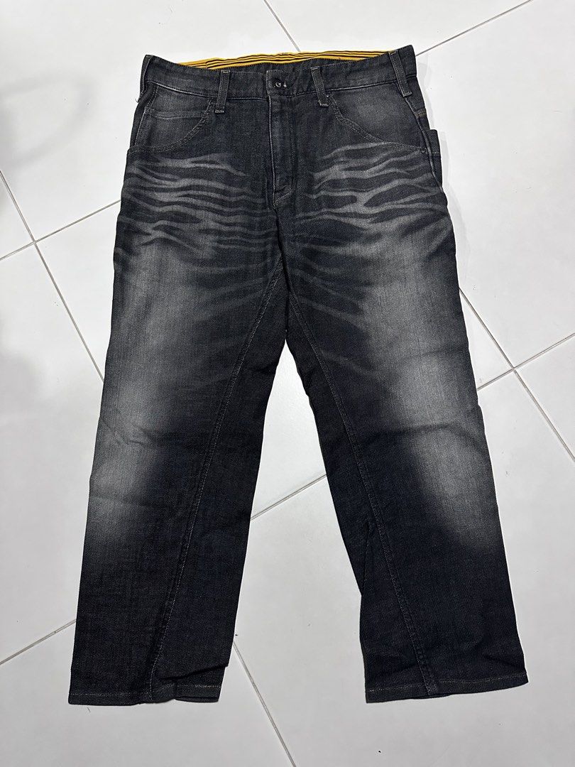 E-function Jeans (Category: Jeans) located in Singapore. Submitted by anson_2828 (Listing ID 1452435641, Image 2). Description: - Brand: E-function Jeans - Size: M - Color: Dark wash with unique textured detailing - Style: Casual, everyday wear - Condition: Excellent, pre-loved.