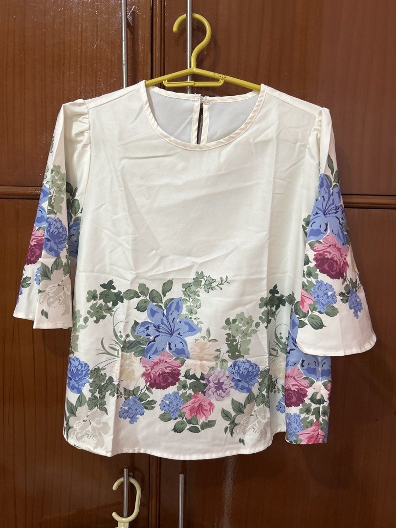 Floral Top and Striped T-shirt Bundle (Category: Shirts) located in Cauayan City . Submitted by lenkapreloved (Listing ID 1452348829, Image 3). Description: - Bundle includes two tops: - White top with floral print and bell sleeves - Green and white striped t-shirt - Both are great for casual wear - Easily pair with jeans or skirts.
