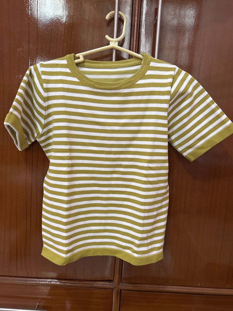 Floral Top and Striped T-shirt Bundle (Category: Shirts) located in Cauayan City . Submitted by lenkapreloved (Listing ID 1452348829, Image 2). Description: - Bundle includes two tops: - White top with floral print and bell sleeves - Green and white striped t-shirt - Both are great for casual wear - Easily pair with jeans or skirts.