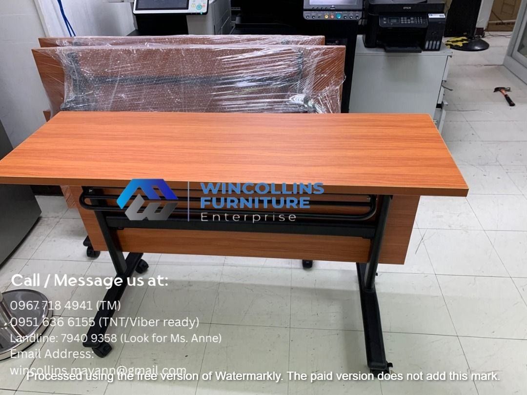 Folding Training Table / Study Desk with modesty (Category: Tables & Sets) located in Caloocan City. Submitted by mayanncamu.furniture (Listing ID 1452330785, Image 2). Description: Folding Training Table / Study Desk Melamine scratch proof table top and modesty With 2nd layer shelf Black Tubular legs with caster wheels Color: Beech.