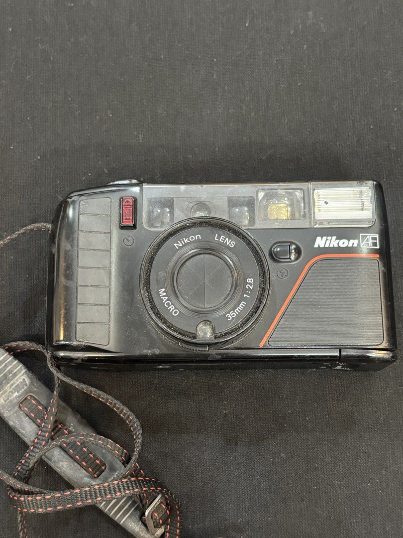 (FOR RENT) Nikon AF Film Camera (Category: Cameras) located in Manila. Submitted by ram6875 (Listing ID 1452385108, Image 1). Description: ₱250 for 1 to 3 days Add ₱50 per day if you want to extend Message for more details! 😄 .
