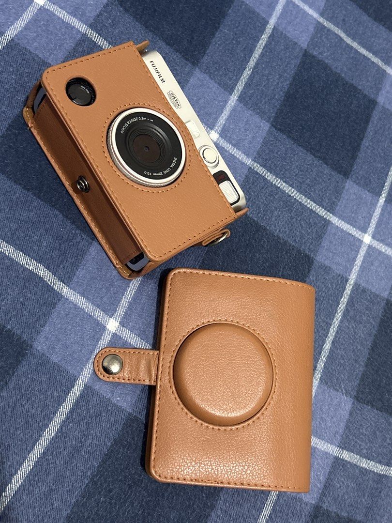 Fujifilm Instax Mini Evo Leather Camera Case (Category: Cameras) located in Manila. Submitted by calmmoon_0f900a (Listing ID 1452448975, Image 2). Description: - Genuine brown leather case for Fujifilm Instax Mini Evo. - Provides excellent protection against scratches. - Features a detachable front cover for easy shooting. - Snugly fits your camera for a secure feel. - Ideal for taking your Instax Mini Evo anywhere. .