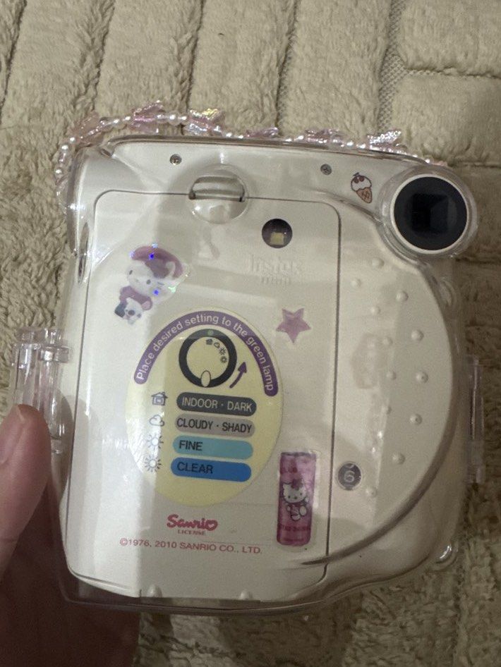 Fujifilm Limited Edition Hello Kitty Instax Mini 7 (free case & charm) (Category: Cameras) located in Quezon City. Submitted by matchaislove (Listing ID 1447797505, Image 2). Description: - WORKING - Fujifilm Instax Mini 7 Limited Edition - 'Hello Kitty' text on the lens - Includes a stylish pink beaded strap.