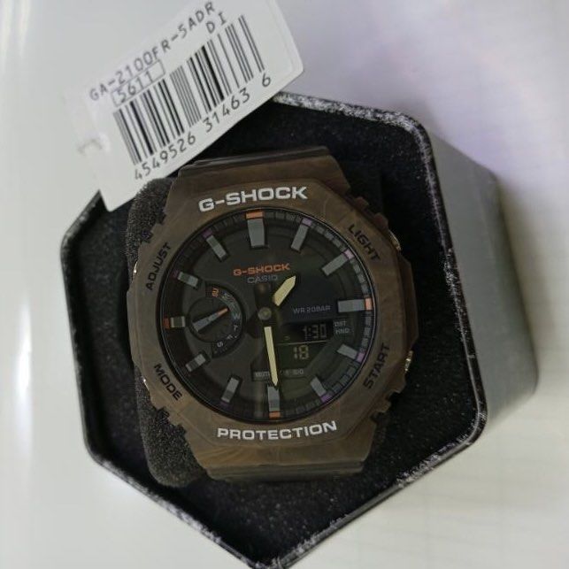 Gshock Mystic Forest GA2100FR-5A (Category: Other Sports Equipment and Supplies) located in Manila. Submitted by seikowatchfactory (Listing ID 1452443466, Image 2). Description: BNIB 10/10 Model: GA2100FR-5A Price: 5295 pesos Specifications: Carbon Core Guard Diameter: 45.4mm Height: 11.8mm Material: Resin World Time - 31 Time Zones 1/100 second stopwatch Count Down Timer 5 daily alarms Double LED Lights Full Auto-Calendar 12/24-hour time format 