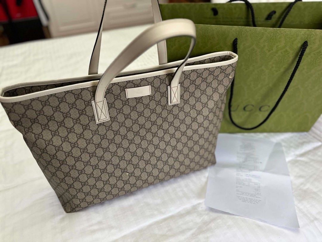 Gucci Supreme Tote Bag (Category: Luxury Bags & Wallets) located in Mandaluyong City. Submitted by bugsbunny0326 (Listing ID 1452353464, Image 2). Description: Authenticity Guaranteed Well Used with paperbag and receipt only See photos for detailed flaws. .