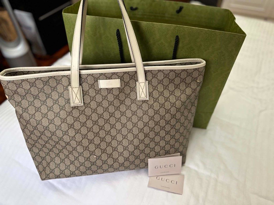 Gucci Supreme Tote Bag (Category: Luxury Bags & Wallets) located in Mandaluyong City. Submitted by bugsbunny0326 (Listing ID 1452353464, Image 1). Description: Authenticity Guaranteed Well Used with paperbag and receipt only See photos for detailed flaws. .