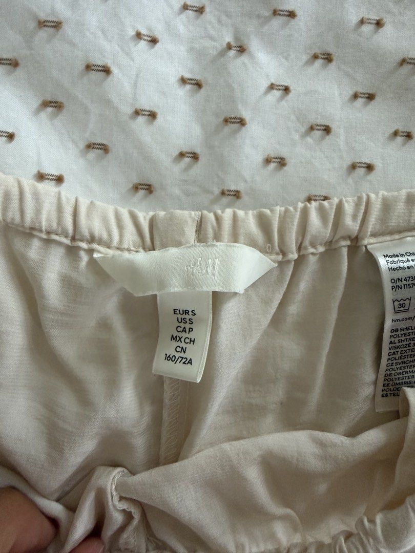 H&M Beige Wide Leg Pants Size S (Category: Other Bottoms) located in Tanauan. Submitted by lovelavi (Listing ID 1452383687, Image 3). Description: H&M pants (material is thin, soft, and flowy) - has a slight stain at the hem (?) not sure if it can be removed thru washing Long on me (height is 5’2).