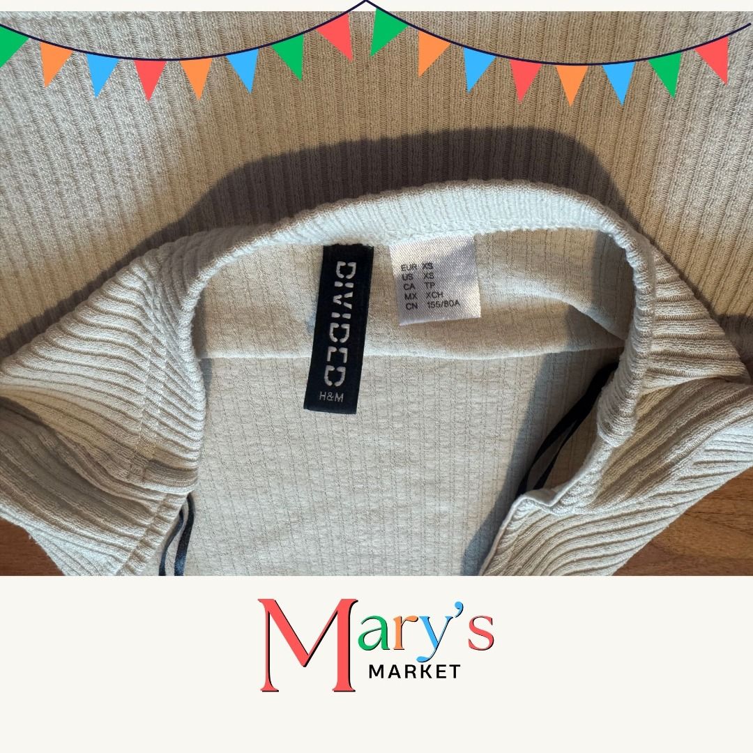 H&M DIVIDED Light beige / Cream Halter Ribbed Crop Top (Category: Sleeveless) located in Taguig. Submitted by marysmarket (Listing ID 1452500290, Image 3). Description: So easy to pair with any outfit. Great fit as well! RFS: Too many similar tops :(.