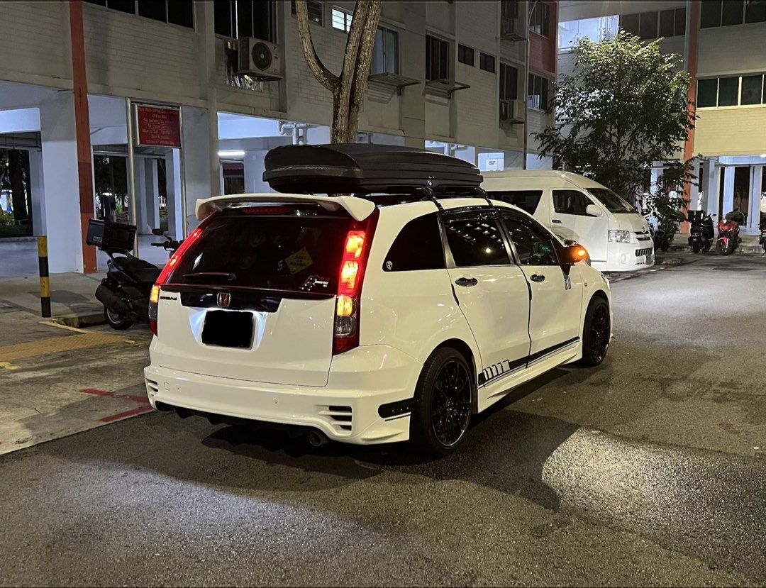 Honda Stream 1.8 (A) (Category: Used Cars) located in Singapore. Submitted by GoodSalesDepartment (Listing ID 1365659368, Image 2). Description: Super Good Condition Honda Stream RN6 with MUGEN Bodykit. Replaced most of the parts. 1) Engine and gearbox gasket all replaced. 2) most Wear and tear all replaced. 3) Engine mounting all replaced. 4) Spark plug all replaced 5) ignition coil replaced. 6) TITAN SP3 coilover (SG selling $2.8k). 7) New IU. 