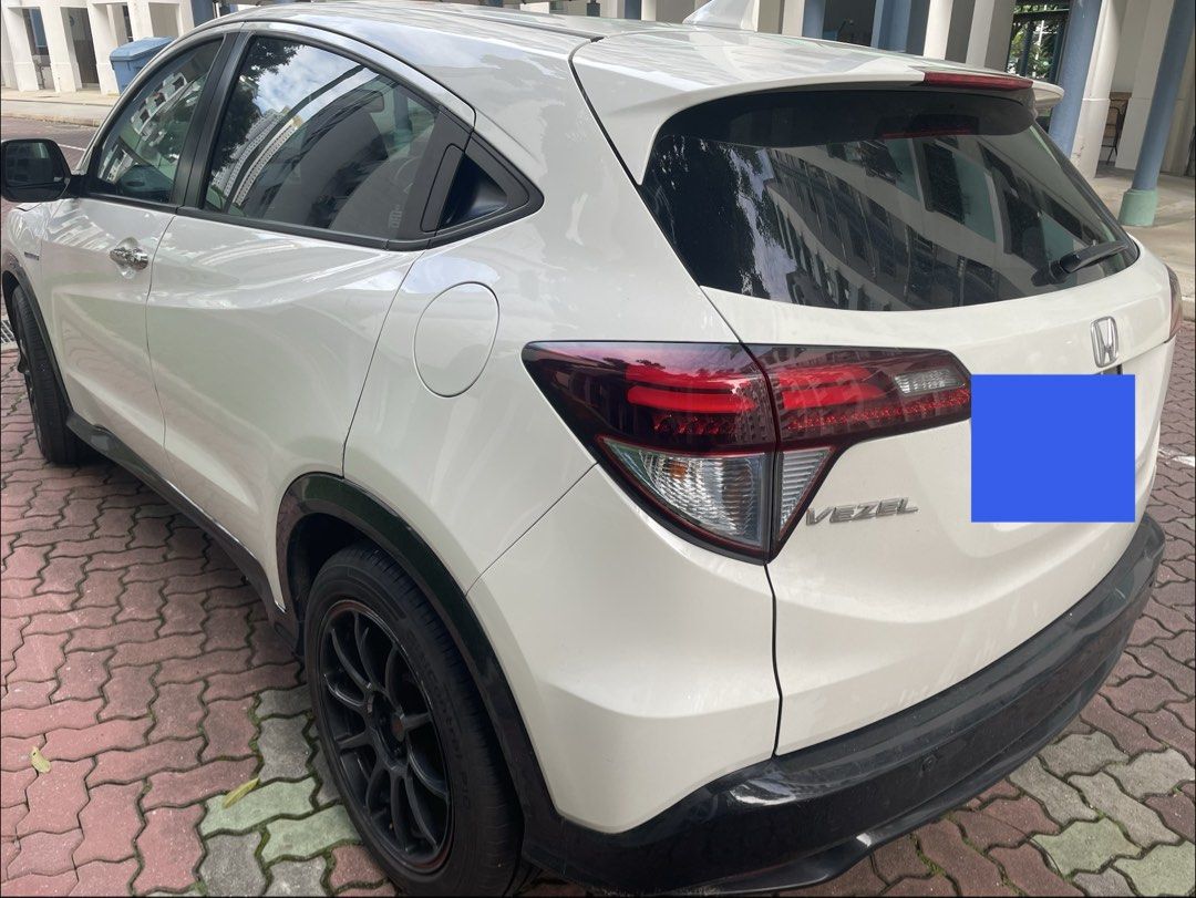 Honda Vezel Hybrid Vezel hybrid RS Auto (Category: Used Cars) located in Singapore. Submitted by pw6055 (Listing ID 1452427826, Image 3). Description: RARE unit ……..Direct owner sale. NON PHV NO SALE AGENT PLEASE The Honda Vezel Hybrid RS is a sporty top-spec compact SUV featuring a 1.5L i-VTEC engine and an intelligent dual-clutch hybrid system (i-DCD). It delivers about 150 hp while offering excellent fuel efficiency (up to ~24.2 km/L). Key Spe