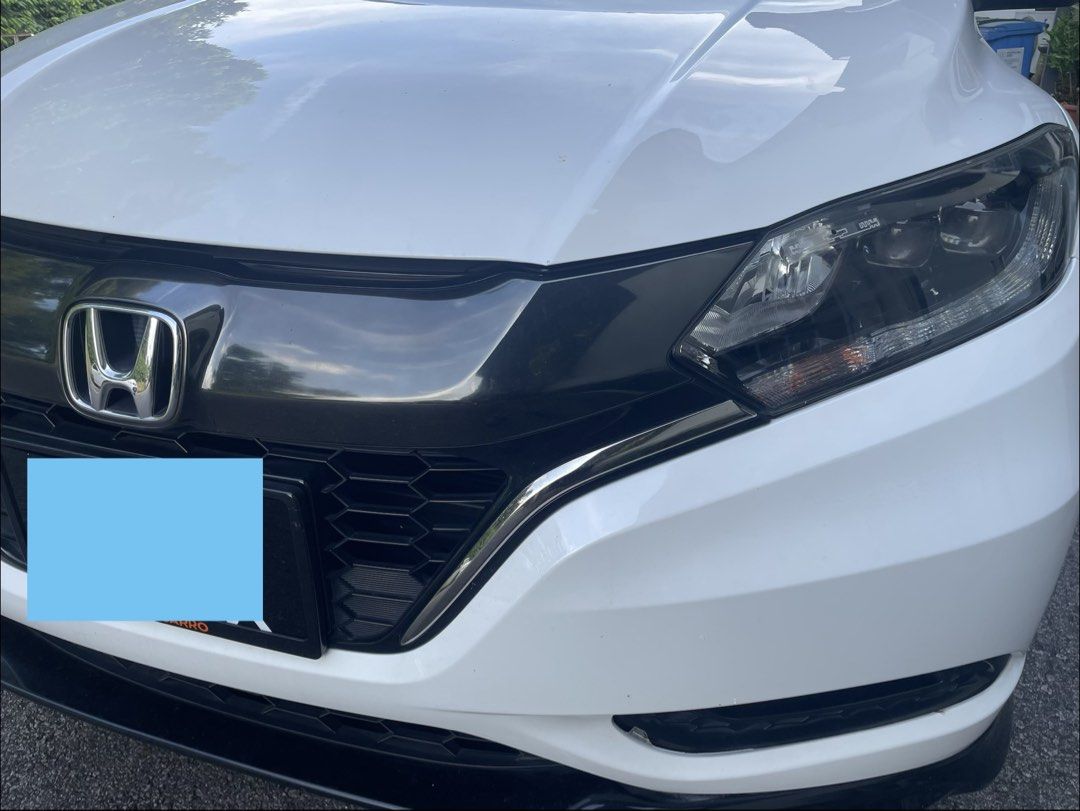 Honda Vezel Hybrid Vezel hybrid RS Auto (Category: Used Cars) located in Singapore. Submitted by pw6055 (Listing ID 1452427826, Image 2). Description: RARE unit ……..Direct owner sale. NON PHV NO SALE AGENT PLEASE The Honda Vezel Hybrid RS is a sporty top-spec compact SUV featuring a 1.5L i-VTEC engine and an intelligent dual-clutch hybrid system (i-DCD). It delivers about 150 hp while offering excellent fuel efficiency (up to ~24.2 km/L). Key Spe