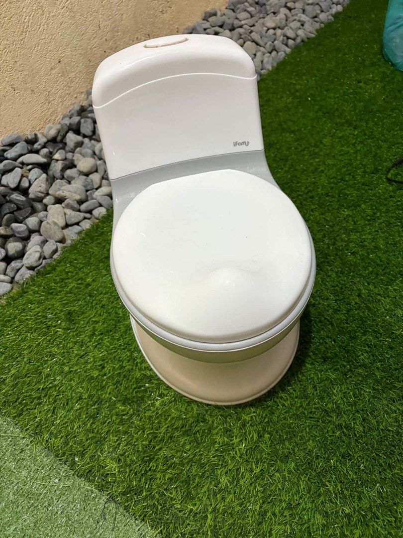 Ifam Potty Training Toilet Seat (Category: Toilet Training) located in Quezon City. Submitted by mnikavllnv (Listing ID 1452467342, Image 3). Description: - White potty training toilet seat - Features a grey accent band - Designed to mimic a real toilet for easier transition - Easy to clean and maintain - Perfect for potty training your little one - Ready for its next user! Location: Sumulong Antipolo.