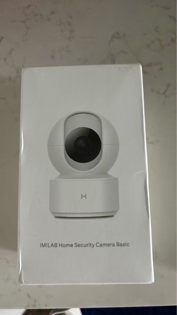 IMILAB Home Security Camera Basic (Category: Security Systems & CCTV Cameras) located in Singapore. Submitted by woo.z.jie (Listing ID 1452357505, Image 1). Description: - IMILAB Home Security Camera Basic - Color: White - Features: Pan-tilt functionality - Ideal for home monitoring - Simple setup and operation - Comes in original packaging.