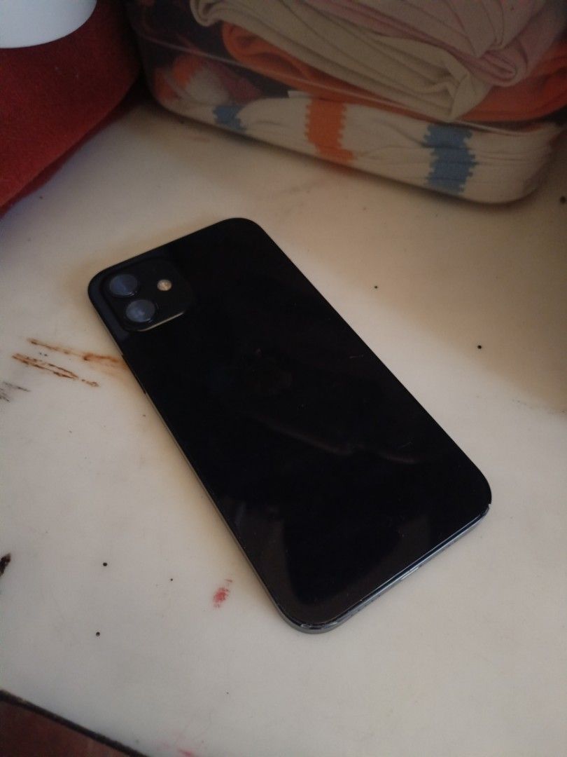 iPhone 12 Openline RUSH (Category: iPhone 12 Series) located in Caloocan City. Submitted by sneak-mark (Listing ID 1452367764, Image 2). Description: iPhone 12 64GB Black (Openline) (Unit and charger but no brick) Condition: All working (Face ID & True Tone OK), no history of repair. Minimal Issues: Battery Health: 78% (Service) Minor scratches/dents (normal wear) Meetup: Caloocan / Monumento / SM Grand Central.
