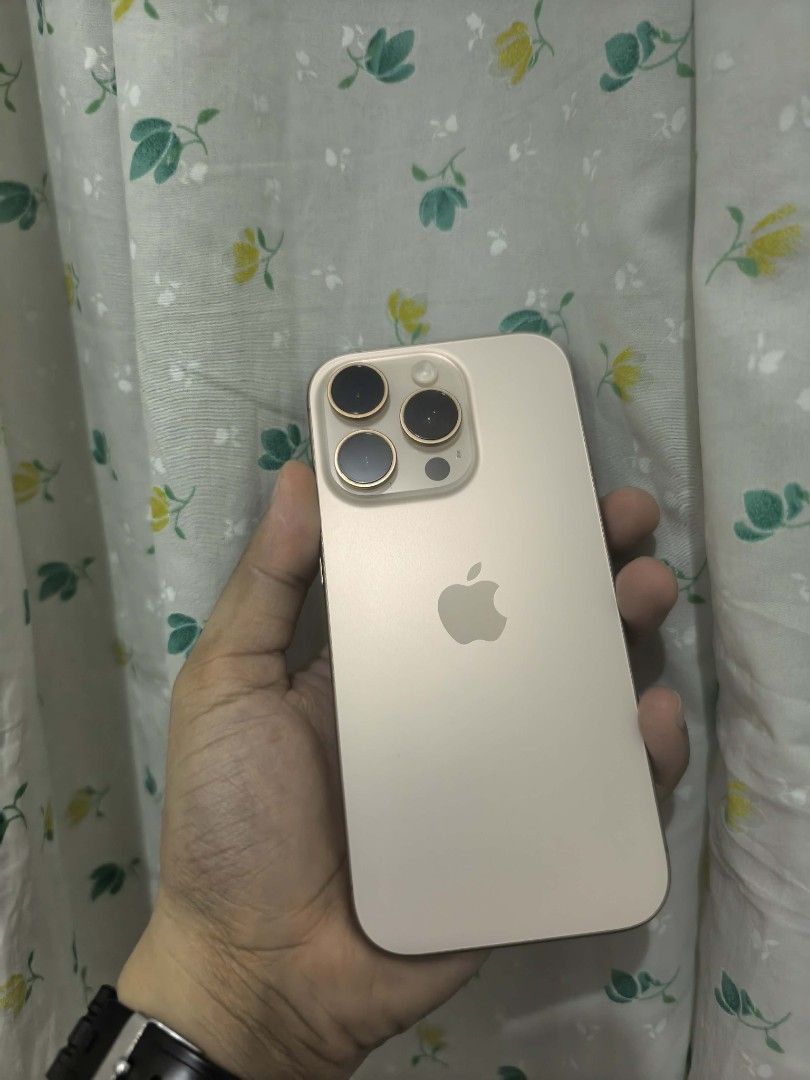 IPHONE 16 PRO DESERT TITANIUM 128gb (Category: iPhone 16 Series) located in Rodriguez. Submitted by ez-gadgets (Listing ID 1452504405, Image 1). Description: Iphone 16 Pro 128gb 91bh no issue unli reset open for swap sa PC set, or any lower iphone series + cash. Open for meetup..