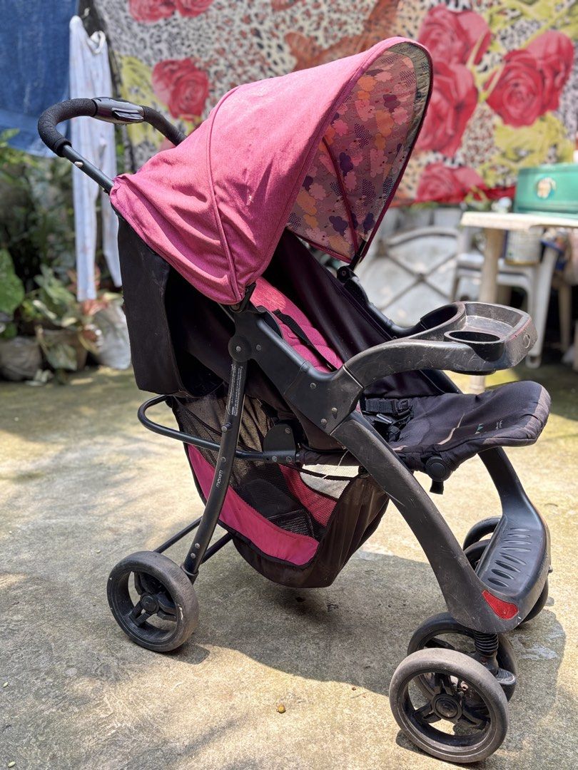 Juniors Baby Stroller - Pink (Category: Strollers) located in Malabon City. Submitted by kwisteyndg (Listing ID 1452374006, Image 3). Description: - Pink junior stroller - Canopy with floral print - Tray with cup holder - Storage basket underneath - Safety harness - Folds for easy storage - Ready for your little one's adventures!.