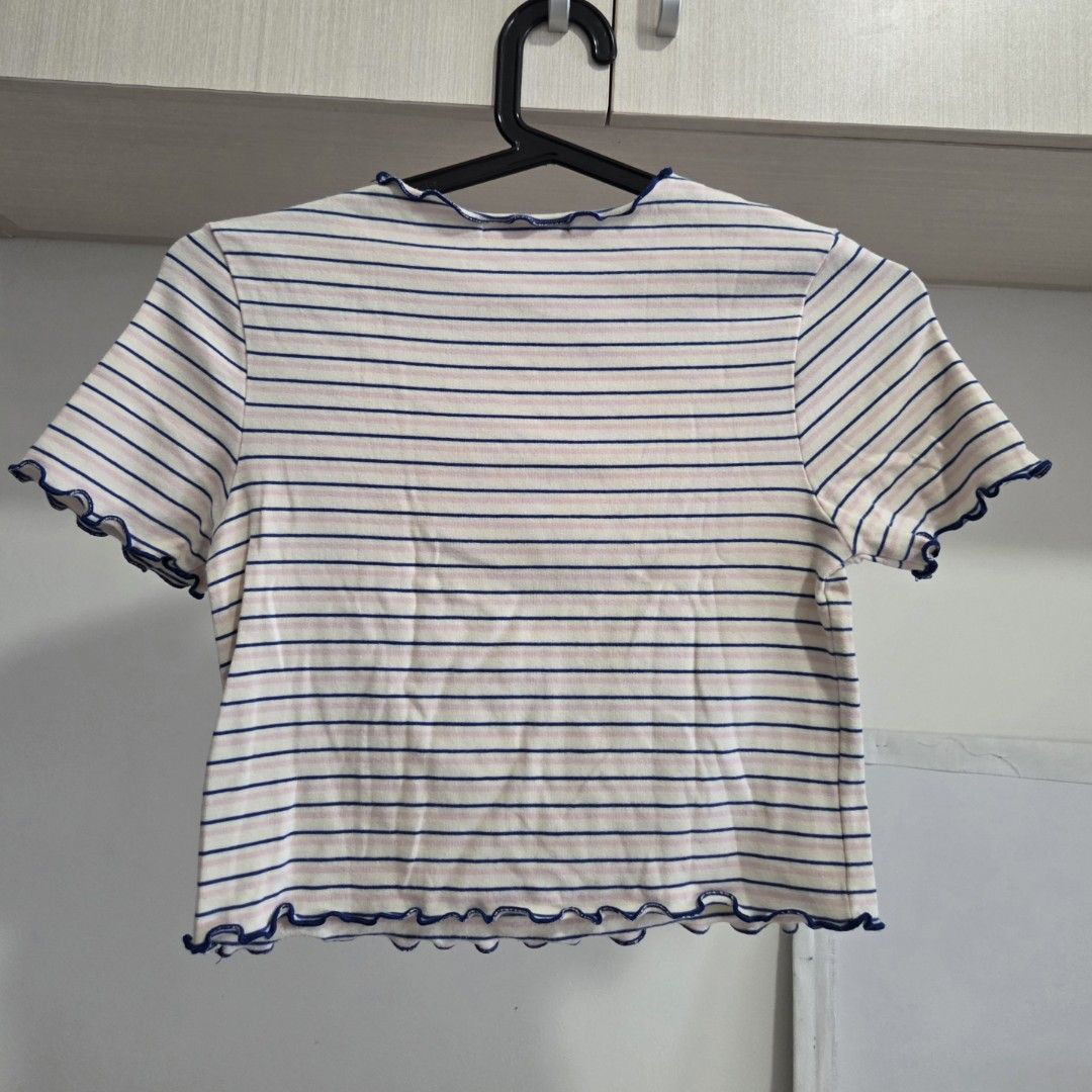 Just G Striped Lettuce-Hem Crop Top (Category: Blouses) located in Manila. Submitted by weirdlysa (Listing ID 1452375816, Image 2). Description: - Just G branded crop top - white color with blue and pink stripes - dark blue lettuce hem on the neckline and sleeves - best fits women's size S-M - stretchy, light material - good condition.