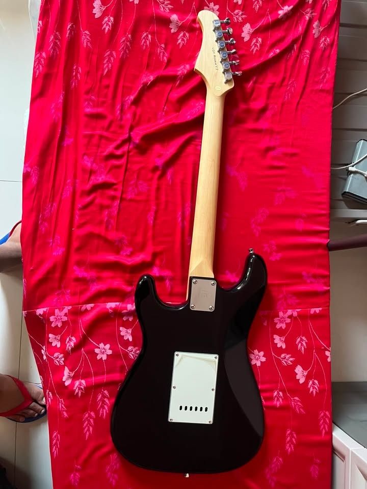 LGY ROOKIE STRATOCASTER V2 (Category: Musical Instruments) located in Caloocan City. Submitted by mannexc617678 (Listing ID 1452323713, Image 2). Description: - LGY electric guitar neck - Made of light-colored wood (likely maple) - Neck plate with LGY logo included - Ready for guitar building or repair projects.