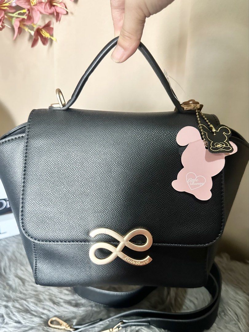 Little Bunny Handle Bag (Category: Shoulder Bags) located in Rizal. Submitted by stuffbuyph (Listing ID 1452351837, Image 3). Description: - Stylish black handbag - Versatile: top handle and detachable shoulder strap included - Practical interior zippered pocket - Ideal for daily use or dressing up for special events.