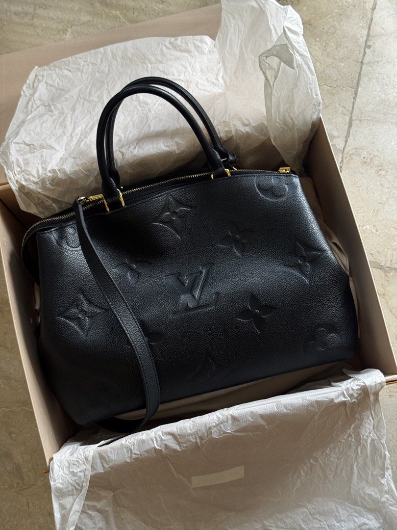 Louis Vuitton Black Grand Palais Bag (Category: Luxury Bags & Wallets) located in Makati City. Submitted by missgiftbox (Listing ID 1452376755, Image 1). Description: - Authtentic Louis Vuitton - Bought from LV Solaire Branch last 2024 - Chic & versatile - Excellent condition, used twice or thrice - Spacious and convenient interior perfect for an everyday bag Inclusions: - detachable shoulder strap - gold hardware: lock & key - dust bag, box, car