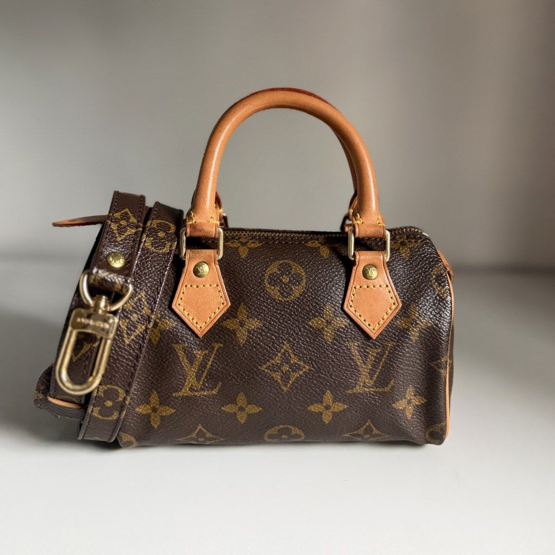 Louis Vuitton Monogram Mini Speedy Bag LV (Category: Luxury Bags & Wallets) located in Quezon City. Submitted by ksumer (Listing ID 1452441269, Image 1). Description: - Classic Louis Vuitton Mini Speedy bag - Monogram canvas with vachetta leather trim and handles - Detachable shoulder strap included - Gold hardware - Secure zipper closure - Compact and perfect for essentials.
