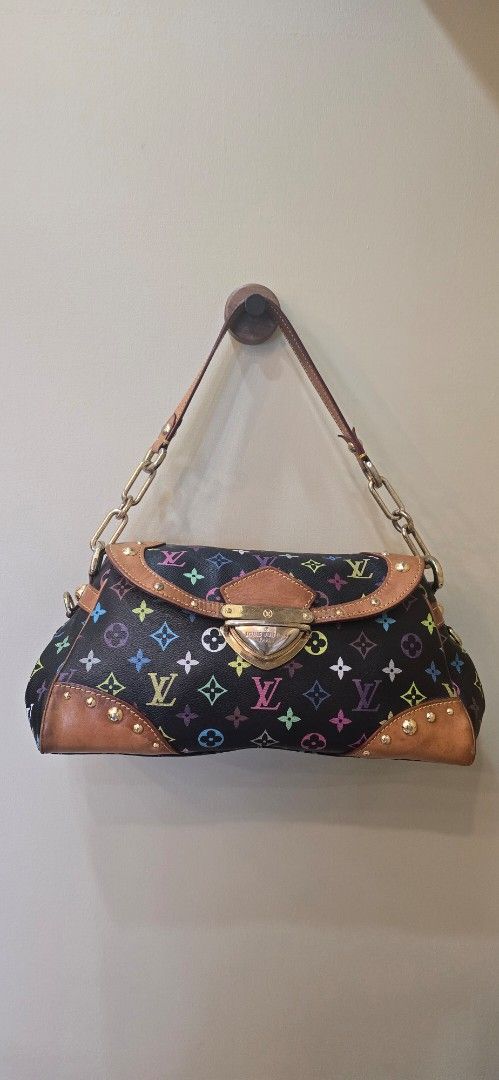 LOUIS VUITTON Monogram Multicolore Speedy Bag (Category: Luxury Bags & Wallets) located in Cebu City. Submitted by chasen_92 (Listing ID 1452497970, Image 1). Description: - Authentic Louis Vuitton Monogram Multicolore Speedy bag - Iconic Murakami multicolor print on black canvas - Features leather trim and gold-tone hardware - Classic collectible piece - Shows some signs of wear on leather trim and hardware.
