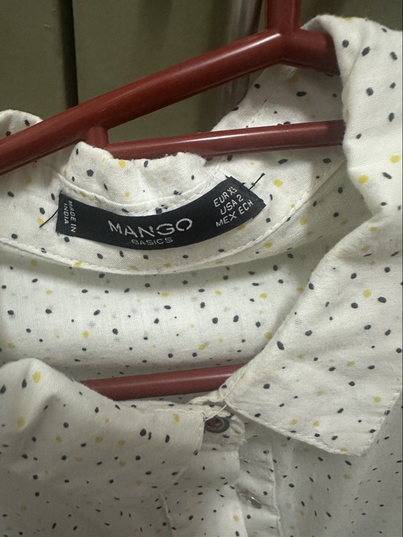 Mango button down shirt (Category: Longsleeves) located in Manila. Submitted by msf10 (Listing ID 1452484157, Image 2). Description: This Mango Basics shirt features a subtle polka dot pattern and functional chest pockets. RFS: decluttering.