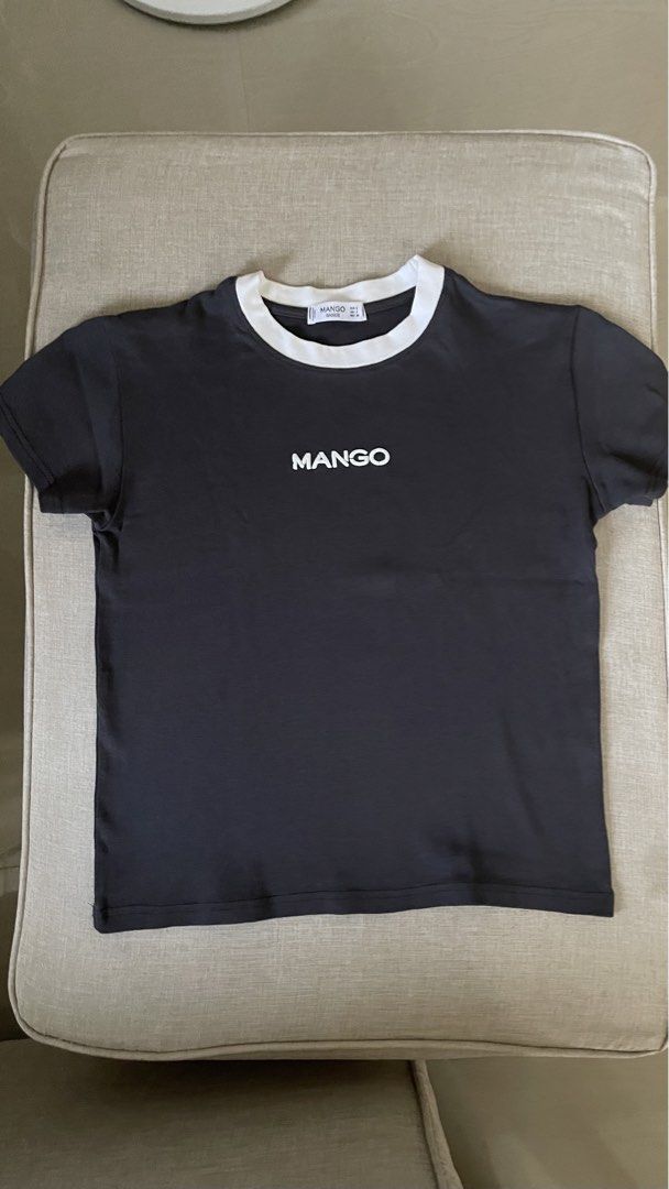Mango Charcoal T-shirt with White Collar (Category: Shirts) located in Angat. Submitted by eltiff (Listing ID 1452437746, Image 1). Description: - Worn once only - Fits up to bust size 34 - Color: Charcoal - Style: Relaxed fit - Feature: White contrast collar - Detail: Simple logo on the front - Sleeves: Short - Style: Casual wear - Versatile: Easy to pair with jeans or shorts.