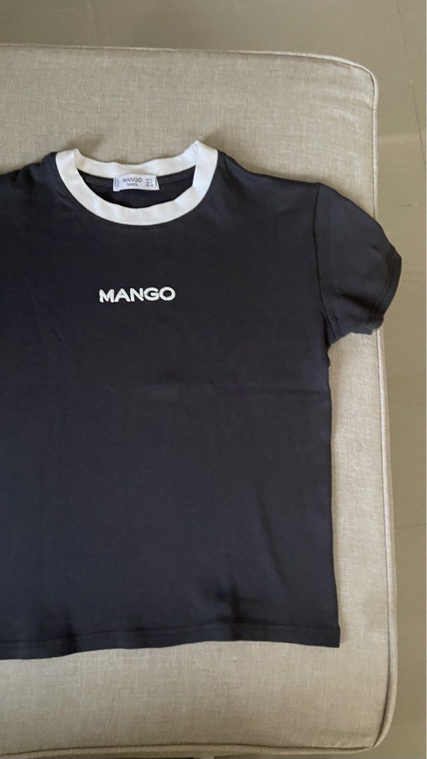 Mango Charcoal T-shirt with White Collar (Category: Shirts) located in Angat. Submitted by eltiff (Listing ID 1452437746, Image 3). Description: - Worn once only - Fits up to bust size 34 - Color: Charcoal - Style: Relaxed fit - Feature: White contrast collar - Detail: Simple logo on the front - Sleeves: Short - Style: Casual wear - Versatile: Easy to pair with jeans or shorts.
