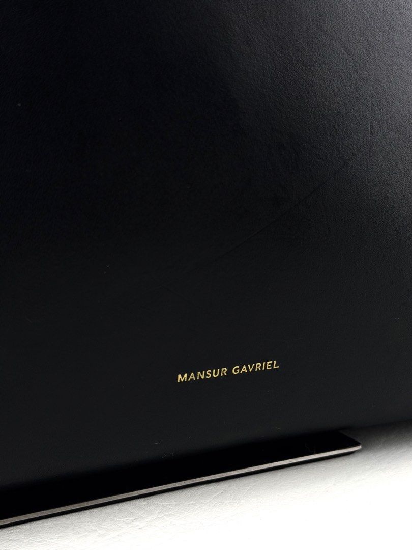 MANSUR GAVRIEL Icon Tote (Category: Luxury Bags & Wallets) located in Manila. Submitted by luvluxe.mnl (Listing ID 1452360615, Image 2). Description: Medium size— fits a lot Super nice & elegant!! With minimal signs of use inside seen in pic but the still presentable and well functional. Missing pouch Overall in very good condition Must have!!.