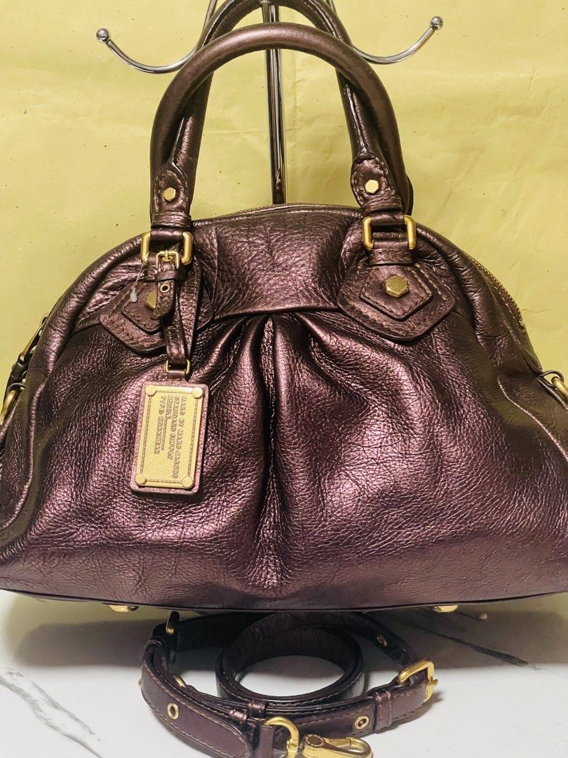 Marc by Marc Jacobs Metallic Leather Satchel Bag (Category: Luxury Bags & Wallets) located in Manila. Submitted by ermenchita71969 (Listing ID 1452466042, Image 1). Description: - Metallic bronze leather satchel bag - Top handles and detachable shoulder strap - Interior zip pocket and slip pocket - Zipper closure - Made in Indonesia - Ideal everyday bag.