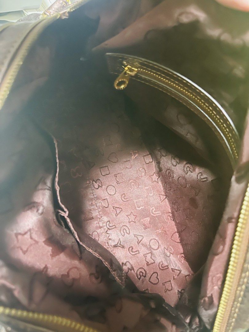 Marc by Marc Jacobs Metallic Leather Satchel Bag (Category: Luxury Bags & Wallets) located in Manila. Submitted by ermenchita71969 (Listing ID 1452466042, Image 3). Description: - Metallic bronze leather satchel bag - Top handles and detachable shoulder strap - Interior zip pocket and slip pocket - Zipper closure - Made in Indonesia - Ideal everyday bag.